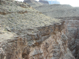 The trail from Escalante to 75 Mile canyon winds right along the edge.